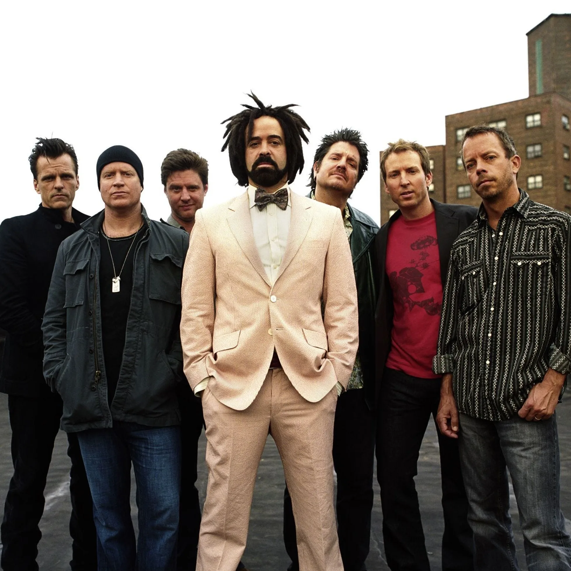 Counting Crows classic group photo featuring Adam Duritz with dreadlocks.