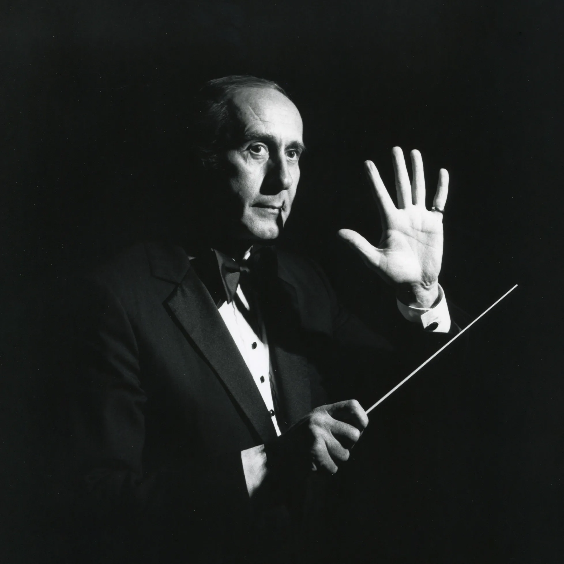 Henry Mancini portrait with conductor's baton.