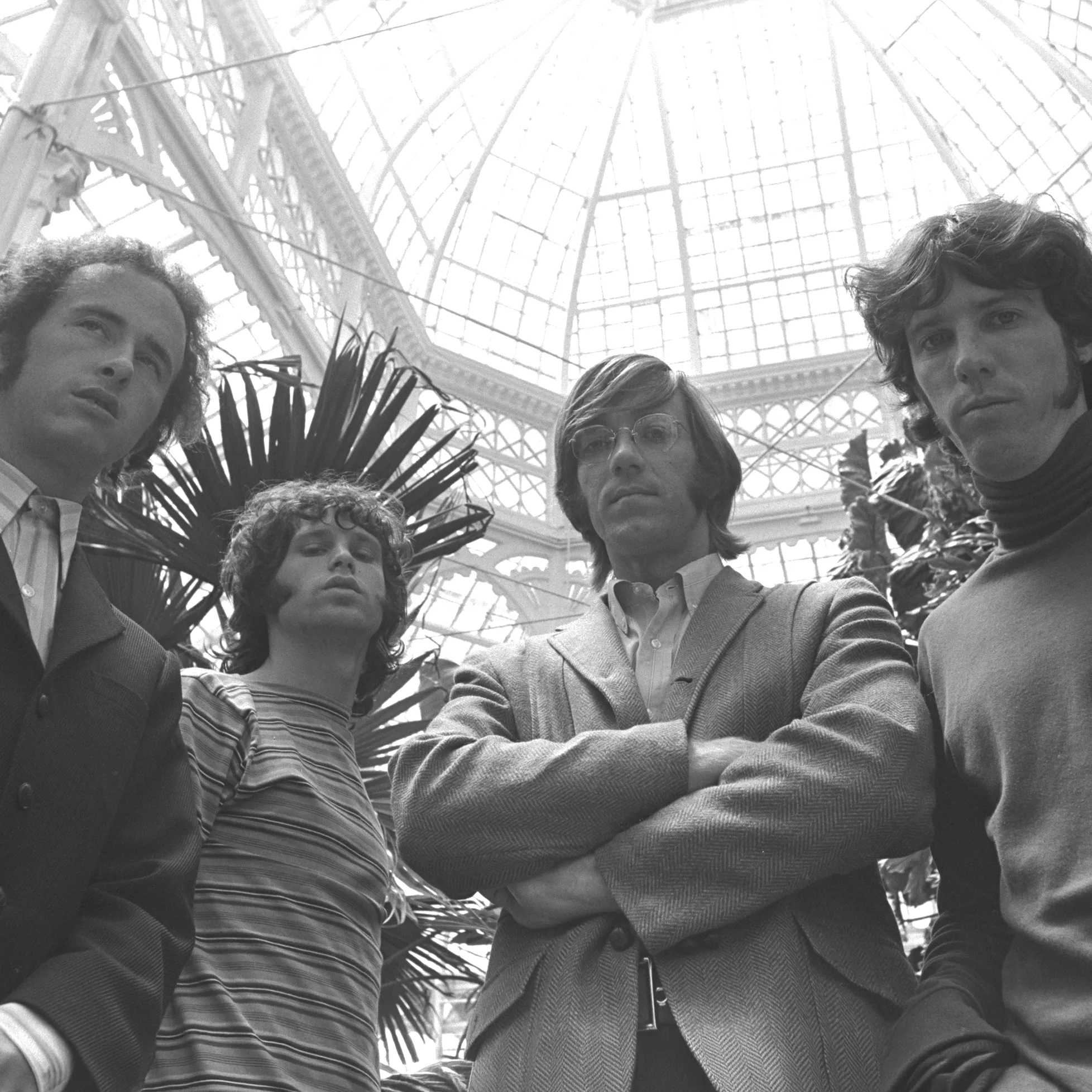 The Doors in glasshouse portrait.