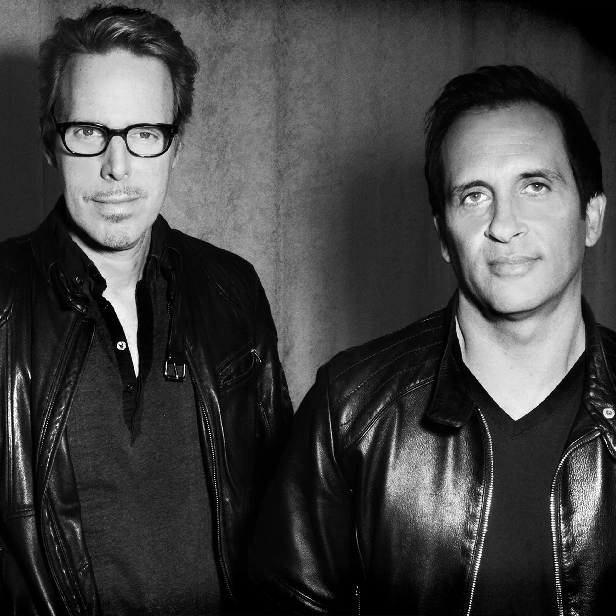 Carl Sturken and Evan Rogers in black leather jackets.